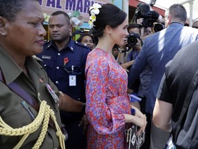 Meghan, Duchess of Sussex during a visit to a market in Suva, Fiji, Wednesday, Oct. 24, 2018. Britain's Prince Harry and his wife Meghan are on day nine of their 16-day tour of Australia and the South Pacific.