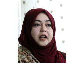 In this Sunday, Oct. 14, 2018 photo, Hameeda Danesh, a candidate for Parliament, hoping to represent the deeply conservative district of Jalrez in central Wardak province, speaks during an interview with The Associated Press, in Kabul, Afghanistan. In Saturday's election 417, or roughly 16 percent, of the 2,565 candidates competing for seats in the 249-member chamber are women. Yet in rural Afghanistan, especially in the country's ethnic Pashtun areas where the Taliban dominate, many women are not even registered to vote.