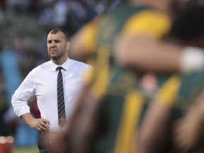Australia's coach Michael Cheika listens to the anthems prior to a Rugby Championship rugby match against Argentina in Salta, Argentina, Saturday, Oct. 6, 2018.