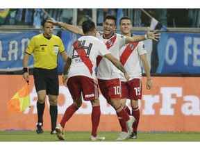 Gonzalo Martinez of Argentina's River Plate (10) celebrates scoring from the penalty spot his side's second goal against Brazil's Gremio during a Copa Libertadores second leg semifinal match in Porto Alegre, Brazil, Tuesday, Oct. 30, 2018.