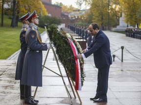 Egyptian President Abdel Fattah el-Sissi attends a wreath-laying ceremony at the Tomb of the Unknown Soldier in Moscow, Russia, Tuesday, Oct. 16, 2018.