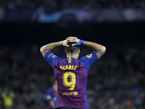 Barcelona forward Luis Suarez reacts during the Champions League, Group B soccer match between Barcelona and Inter Milan, at the Nou Camp in Barcelona, Spain, Wednesday, Oct. 24, 2018.
