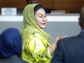 Rosmah Mansor, wife of Malaysian Prime Minister Najib Razak, arrives at the Anti-Corruption Agency for questioning in Putrajaya, Wednesday, Oct. 3, 2018. Rosmah is to be questioned by the country's anti-graft agency for the third time as investigators prepare possible charges against her including money laundering in the multi-billion-dollar scandal.