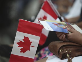 New Canadians sworn in at Pearson International Airport in Toronto on Monday June 30, 2014.