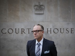 Executive Director and general counsel for the Canadian Civil Liberties Association, Michael Bryant, poses for a photograph at the Superior Court of Justice in Toronto, Ont., on Nov. 8, 2018.