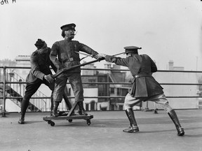 Canadians being trained in bayonet fighting with a dummy resembling a German soldier.