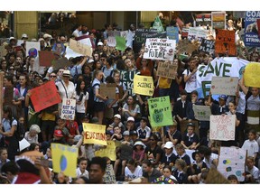 Thousands of students gather during a rally demanding the government act on climate change, in Sydney, Friday, Nov. 30, 2018. The coordinated rallies Friday were held in close to 30 cities and towns.