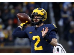 Michigan quarterback Shea Patterson (2) throws against Indiana in the first half of an NCAA college football game against Indiana in Ann Arbor, Mich., Saturday, Nov. 17, 2018.