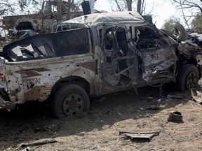 This picture taken on October 24, 2018 shows the wreckage of a car reportedly destroyed in an air strike in downtown of Hodeida.