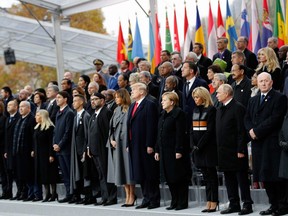 World leaders including Israeli Prime Minister Benjamin Netanyahu, Canadian Prime Minister Justin Trudeau, Moroccan King Mohammed VI, U.S. President Donald Trump, German Chancellor Angela Merkel and Russian President Vladimir Putin attend a ceremony at the Arc de Triomphe in Paris on November 11, 2018 as part of commemorations marking the 100th anniversary of the 11 November 1918 armistice, ending the First World War.