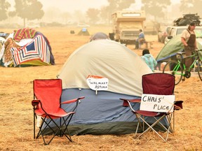 A makeshift address is seen on a tent at an evacuee encampment in a Walmart parking lot in Chico, California on November 15, 2018.