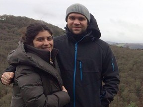 This file handout photo released by the family of British student Matthew Hedges via the Detained in Dubai organization on October 11, 2018 shows him (R) and his wife Daniela Tejada (L).