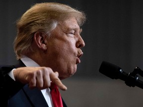 Donald Trump delivers remarks at a Make America Great Again rally in Biloxi, Mississippi, on November 26, 2018.