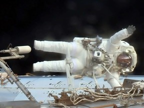 This NASA TV video grab shows astronaut Jack Fischer outside the International Space Station on May 23, 2017.