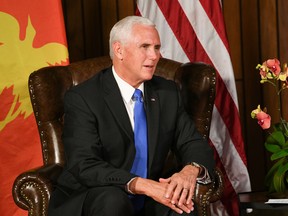 US Vice President Mike Pence speaks on the sidelines of the Asia-Pacific Economic Cooperation Summit.