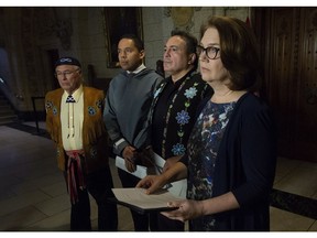 Indigenous Services Minister Jane Philpott (right), Assembly of First Nations Chief Perry Bellegarde, President of the Inuit Tapiriit Kanatami Natan Obed and Metis National Council President Clement Chartier (left) wait to be start a news conference in Ottawa, Friday November 30, 2018.