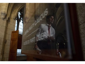 Prime Minister Justin Trudeau makes his way to caucus on Parliament Hill in Ottawa, Wednesday November 28, 2018.