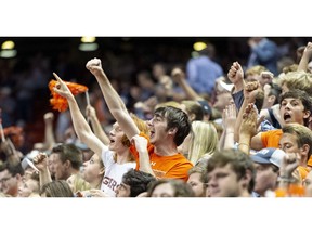 Auburn fans cheer against South Alabama during the first half of an NCAA college basketball game, Tuesday, Nov. 6, 2018, in Auburn, Ala.