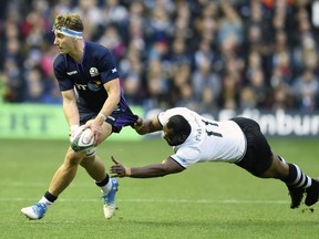 Jamie Ritchie of Scotland, left, is tackled by Vereniki Goneva of Fiji during the International Rugby match between Scotland and Fiji, at the BT Murrayfield Stadium, in Edinburgh, Scotland, Saturday, Nov. 10, 2018.