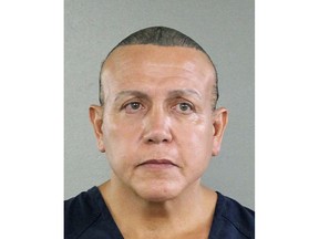 ADDS DATE TO PHOTO TAKEN: In this Aug. 30, 2015 photo released by the Broward County Sheriff's office, Cesar Sayoc is seen in a booking photo, in Miami. Federal authorities took  Sayoc, 56, of Aventura, Fla., into custody Friday, Oct. 26, 2018 in Florida in connection with the mail-bomb scare that earlier widened to 12 suspicious packages, the FBI and Justice Department said. (Broward County Sheriff's Office via AP)