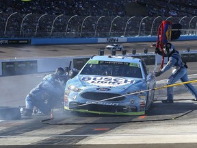 Kevin Harvick (4) has a pit stop on lap 74 during a NASCAR Cup Series auto race on Sunday, Nov. 11, 2018, in Avondale, Ariz.