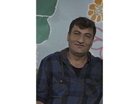 In this photo undated photo released by the Syrian anti-government activist group Kafranbl News, which has been authenticated based on its contents and other AP reporting, shows a portrait of the anti-Syrian government activist Raed Fares, who was also a vocal critic of Islamic militants, killed on Friday, Nov. 23, 2018, by gunmen with his colleague Hammoud al-Juneid, in Kafr Nabl, south of Idlib. A war monitor and Syrian activists are reporting that masked gunmen in the country's rebel-held northwestern province have killed a prominent figure in Syria's anti-government movement who was also a sharp critic of Islamist militants.