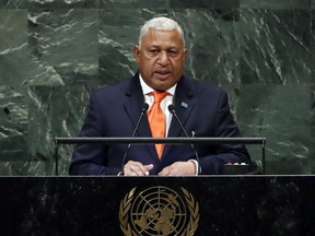 FILE - In this Friday, Sept. 28, 2018, file photo, Fiji's Prime Minister Josaia Voreqe Bainimarama addresses the 73rd session of the United Nations General Assembly, at U.N. headquarters, in New York. Opinion polls indicate Bainimarama is poised to win a second term in Fiji's general election Wednesday after he first held democratic elections in 2014, eight years after he seized power in a coup.