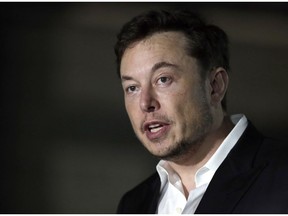 FILE - In this June 14, 2018, file photo, Tesla CEO Elon Musk speaks at a news conference in Chicago. Tesla has announced that Robyn Denholm of Australia's Telstra will become its new board chair. Musk agreed to vacate his post as board chairman as part of a settlement with U.S. regulators of a lawsuit alleging he duped investors with misleading statements about a proposed buyout of the company.