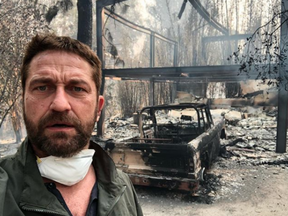 Gerard Butler posts a selfie of himself standing infront of the charred ruins of his Malibu home.