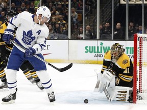 Toronto Maple Leafs' Patrick Marleau looks for a rebound off a save by Boston Bruins goaltender Jaroslav Halak during the first period of an NHL hockey game Saturday, Nov. 10, 2018, in Boston.