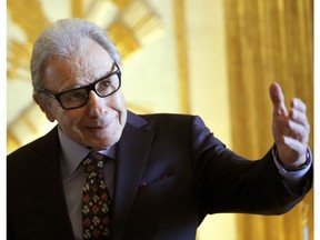 FILE - In this Nov. 10, 2016 file photo, Argentina's composer Lalo Schifrin gestures as he arrives before being awarded Commandeur in the Arts and Letters order by French Culture and Communication minister Audrey Azoulay in Paris. Schifrin has been nominated for six Academy Awards and gone home empty handed every time until now. The Argentinian musician behind the iconic themes for "Mission: Impossible" and "Dirty Harry" will be accepting an honorary Oscar this Sunday, Nov. 18, 2018, at the Governors Awards in Hollywood, alongside actress Cicely Tyson and publicist Marvin Levy.