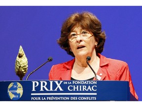 FILE - In this Nov. 24, 2011 file photo, former UN High Commissioner for Human Rights, from Canada and former Chief Prosecutor of the International Criminal Tribunals for the former Yugoslavia and Rwanda, Louise Arbour, delivers her speech after she received the award of the Fondation Chirac during a ceremony at Quai Branly Museum in Paris. Arbour, the U.N. envoy for international migration said Tuesday, Nov. 27, 2018, she's "very disappointed" that some countries are reneging on their support for a global compact to promote safe and orderly migration and reduce human smuggling and trafficking - some for "bizarre" reasons.