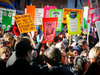 People protest the federal government’s energy policies outside an event attended by Prime Minister Justin Trudeau in Calgary, Nov. 22, 2018.