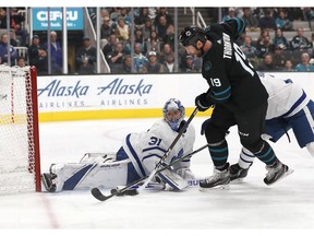 Toronto Maple Leafs goaltender Frederik Andersen (31), of Denmark, makes a save against San Jose Sharks center Joe Thornton (19) during the first period of an NHL hockey game in San Jose, Calif., Thursday, Nov. 15, 2018.