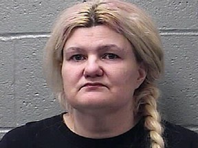 This photo provided by the St. Francois County Sheriff's Department in Farmington, Mo., shows Malissa Ancona, who faces first-degree murder charges in the February 2017 death of Frank Ancona, who called himself an "imperial wizard" of the Ku Klux Klan. Ancona last year agreed to testify against her son, whom she originally blamed in the shooting but in a Sept. 26, 2018, letter to a judge says that she, not her son, pulled the trigger. (St. Francois County Sheriff's Department via AP)