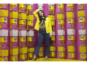 Instagram influencer Negin Tavana, whose page @Negzila has more than 35,000 followers, is pictured at the pop art installation "Happy Place" in Toronto, on Monday, October 29, 2018.