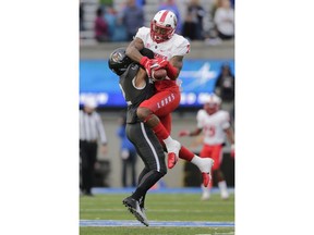 New Mexico wide receiver Delane Hart-Johnson (2) catches a pass against Air Force defensive back Jeremy Fejedelem (2) during the first half of an NCAA college football game, Saturday, Nov. 10, 2018, at Air Force Academy, Colo.