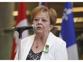 Saskatchewan Finance Minister Donna Harpauer speaks with reporters before a meeting with federal, provincial and territorial finance ministers in Ottawa on June 26, 2018. Saskatchewan's mid-year projected deficit has rose by over $42 million compared to its first-quarter update. The first-quarter update projected the deficit at $306 million but it has since rose to $348.3 million.