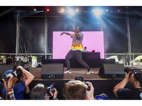 Rapper Pusha T performs at The Governors Ball Music Festival at Randall's Island Park on Saturday, June 2, 2018 in New York. Police say one person suffered life-threatening stab wounds following a series of brawls at a Pusha T concert in Toronto last night. THE CANADIAN PRESS/AP, Scott Roth/Invision/AP)