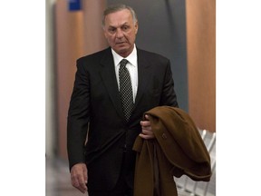 Montreal Canadiens hockey legend Guy Lafleur leaves the courtroom for the lunch break in his lawsuit against the Montreal police and Quebec's attorney-general on Monday, January 12, 2015, in Montreal. The Supreme Court of Canada will not hear former NHL great Guy Lafleur's bid to seek damages stemming from an arrest several years ago.