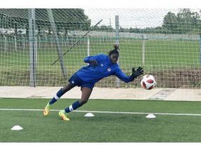 Canada under-17 goalkeeper Kayza Massey is shown during training in Montevideo, Uruguay, in this recent handout photo. Canada coach Rhian Wilkinson is proud of the diversity and accomplishments of her Canadian team at the FIFA U-17 World Cup in Uruguay. "It's Canada in a nutshell isn't it?" said Wilkinson, who won 181 caps for Canada as a player. "It's what we pride ourselves in being -- a team that represents many different faiths and ethnicities and people groups ... I'm proud we're a good representation of our country." Exhibit No. 1 is 17-year-old Ghana-born goalkeeper Kayza Massey, adopted as a baby by Ottawa nurse Karen Massey.