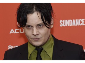 In this Jan. 28, 2016 photo, musician Jack White, an executive producer of "American Epic," poses at the premiere of the four-part PBS music documentary series at the 2016 Sundance Film Festival in Park City, Utah.  White says he's disappointed that two women were told to stop kissing at his recent concert in Edmonton by an usher who said it was "inappropriate sexual behaviour.