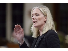 Environment Minister Catherine McKenna speaks during question period in the House of Commons on Parliament Hill in Ottawa on October 25, 2018. Canada's environment ministers are chatting by phone today trying to make headway on a national plastics strategy that would put more onus on plastic producers to keep it from ending up in landfills and waterways. However many expect the conversation to be tense and tinged with the animosity between federal minister Catherine McKenna and provincial ministers who are fighting Ottawa in court over plans to impose a carbon price in their jurisdictions.