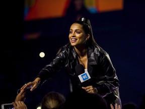 YouTube star Lilly Singh speaks during the We Day event in Toronto on Thursday, Sept. 20, 2018. Singh says she's taking a break from the platform to focus on her mental health.THE CANADIAN PRESS/Christopher Katsarov