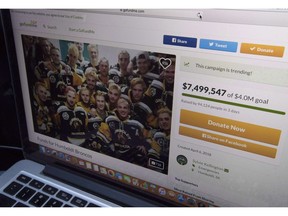A GoFundMe page for the Humboldt Broncos is seen on a computer near Tisdale, Sask., on April, 10, 2018. An advisory committee working on how to distribute $15.2 million raised in a GoFundMe campaign after the Humboldt Broncos bus crash says they will respect the families wishes and distribute the money in an equal way.