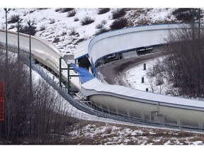 The judge who led an inquiry into the deaths of teenage twins killed during an after-hours bobsled run says Canada Olympic Park should explore using infrared cameras to help prevent similar tragedies. A tarp covers the intersection of the bobsled and luge tracks at Canada Olympic Park in Calgary on February 6, 2016. Jordan and Evan Caldwell, who were 17, were part of a larger group that snuck onto the grounds of the WinSport facility with plastic sleds and headed down the icy track, which was built for the 1988 Olympics.