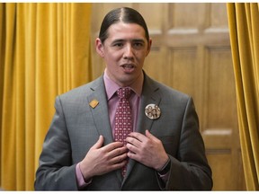 Liberal MP Robert-Falcon Ouellette rises in the House of Commons in Ottawa on May 6, 2016. When Liberal MP Robert-Falcon Ouellette gave a speech last year entirely in Cree, none of his fellow parliamentarians in the House of Commons understood a word he said. That's because Commons rules recognized only French and English as languages deserving of simultaneous translation. But no more.