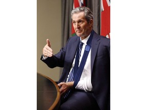 Manitoba Premier Brian Pallister speaks to media at an embargoed press conference before the provincial throne speech at the Manitoba Legislature in Winnipeg, Tuesday, November 21, 2017. A year after he was seriously injured on a wilderness hike in New Mexico, Pallister has returned to the scene and apparently conquered the same trail.