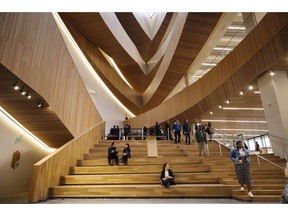 Visitors explore the new Calgary Library following its opening in Calgary, Alta., Thursday, Nov. 1, 2018. A number of visitors to the new central library in East Village say they were frustrated by oversights they encountered during their trip that hindered the experience.