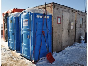 Portable toilets are seen on the Champlain Bridge in Montreal in this undated handout photo. The workers building the new $4.2-billion Champlain Bridge toil in difficult conditions, high above the St. Lawrence River. But one of their biggest challenges has been to find a clean ‚Äî and heated - portable toilet on the huge worksite. A violation notice was issued this week by Quebec's workplace safety board and the consortium Signature on the St. Lawrence was given until Friday to make sure there are enough portable toilets on the construction site and that they have lighting, are heated, and clean.